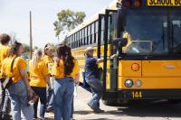 On a yellow school bus, new teachers meet Flowing Wells