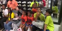 Palm Beach County students receive back-to-school shoes from R&B singer Mark Morrison