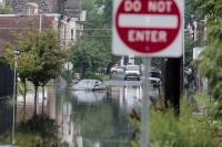 More flooding downpours are possible in the Philly region. A heat advisory is in effect through Saturday.