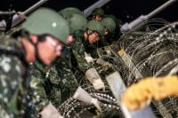 World AFP Taiwan blocks key bridge in drill for potential Chinese invasion