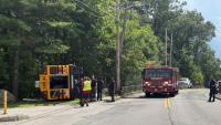 School bus rolls over in Boston, 4 adults injured in crash