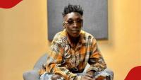 Differently abled artist Katoi Cog earns praise for continuing performance after falling on stage