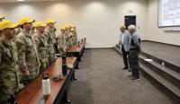 “Flight school class...don your hats!” Legacy Army Aviation leaders speak to new flight school students