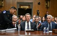US Senate panel votes to hold top COVID expert in contempt