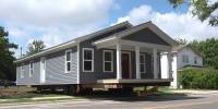 PCC student-built home relocated to West Greenville in affordable housing partnership
