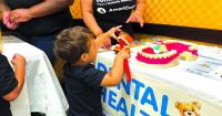 ONE TEDDY BEAR AT A TIME... New Britain clinic teaches children about doctor visits through play