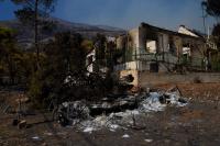 Greece battles new fires as scale of summer devastation emerges