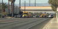 Coroner identifies suspect in shooting that left Las Vegas police officer dead