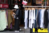 Japan’s households continue to cut spending amid persistent inflation