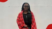Nairobi lady all smiles after landing scholarship to pursue Business Administration in US