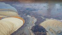 Power failure sent Illinois oil-brine spill coursing 150 miles toward the Mississippi River