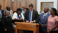 Gov. Meyer signs the Delaware John Lewis Voting Rights Act into law