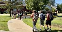 Local high school students wave goodbye to summer break and head back to class