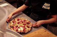 Unorthodox pizza shops spark cultural curiosity, one slice at a time