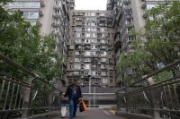 China’s Beijing further relaxes homebuying curb, authorities say