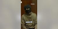 Masked activist rails against 'settler colony' in bizarre rant