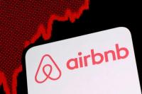 Airbnb hits 4-year high as investors cheer forecast raise, AI payoff