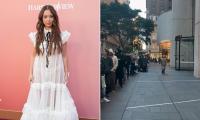 International singer causes chaos in Sydney's CBD as fans form a huge line through Martin Place for a freebie