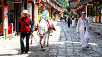 What is China doing to boost its domestic consumption?
