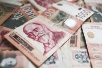 What is Serbia spending millions from the budgetary reserve on?