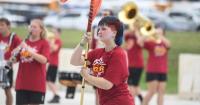 Alex band shows poise, polish in Band Day performance