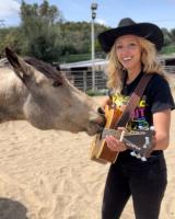 This Musically Inclined Rescue Horse Learned to Play the Guitar and Harp. Now He’s Featured on an Album (Exclusive)