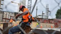 Construction pay is soaring. Much of the job market isn't