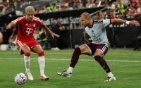 Gomes scores for Aston Villa in defeat by Bayern Munich in Hong Kong