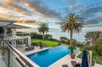 Businesswoman who bought Mike Hosking's home for over $9m now selling her coastal estate