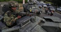 Colombia’s new president takes office in ceremony in Cali highlighting hard line on armed groups