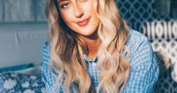Famous country singer Ashley Cooke performs at Voices of America