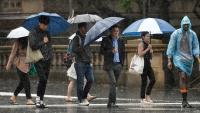 Half of Australia braces for wild weather as massive cloud band approaches