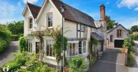 Impressive medieval hall house in village centre goes up for sale