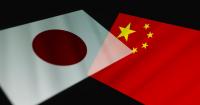China urges Japan to respect its anti-nuclear principles and warns it that it is "playing with fire."