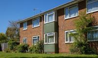 New flats on our estate mean we no longer have a parking space or communal grounds - what are our rights as leaseholders?