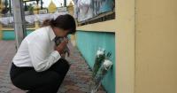 Thai families retrieve bodies after school shooting