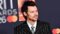 Harry Styles sings â€˜Happy Birthday' for Zane Lowe during rainy concert