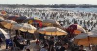 Palestinians flock to the beach in Gaza City to escape the sweltering summer heat