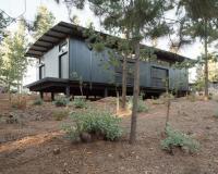 In Chile, Dharq Arquitecto’s pavilion-style home comprises twenty-two sliding doors