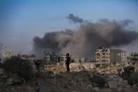 Israel fires, flares, sets fires in various areas of Gaza Strip