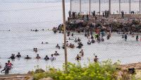 Spain imposes border checks on Italian visitors in row over Ceuta migrants