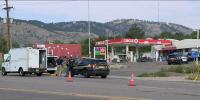 Colorado officer shot while trading fire with armed suspect outside gas station