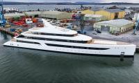 This superyacht makes a splash! £220m mega-vessel with giant swimming pool on board for its 'keen swimmer' owner moors up off South Coast