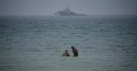 Iran says Strait of Hormuz deal is near, but waterway may not reopen immediately