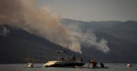 A raging fire in western Canada forces the evacuation of more than 20,000 people.