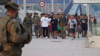 Spain begins border checks on travellers from Italy amid migration showdown