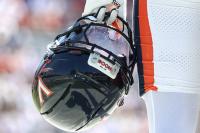 Virginia announces it will integrate past players Holmes, Moore into training camp under court ruling