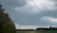 Minnesota storm chasers capture flying debris as possible tornado snaps trees