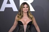 Heidi Klum wows while 'manifesting' during idyllic beach stroll