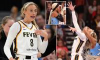 Sophie Cunningham slams WNBA rival for 'playing the race card' after she claimed 'white privilege' caused her to be kicked off the court for brutal foul that left Fever star bloodied